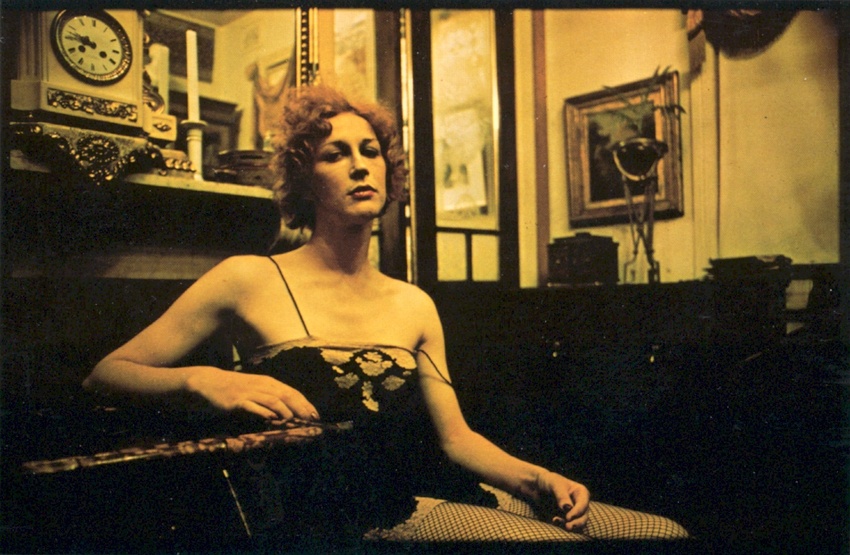 Download the full-sized image of Mel Lounging by a Fireplace