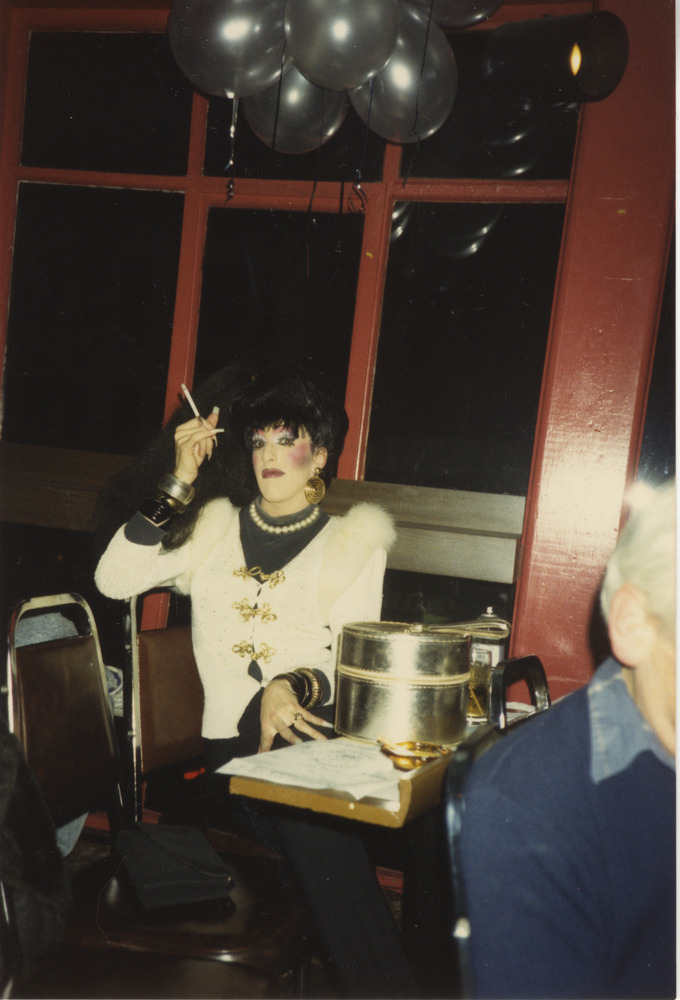 Download the full-sized image of Photograph of Person Smoking in Fuzzy White Jacket