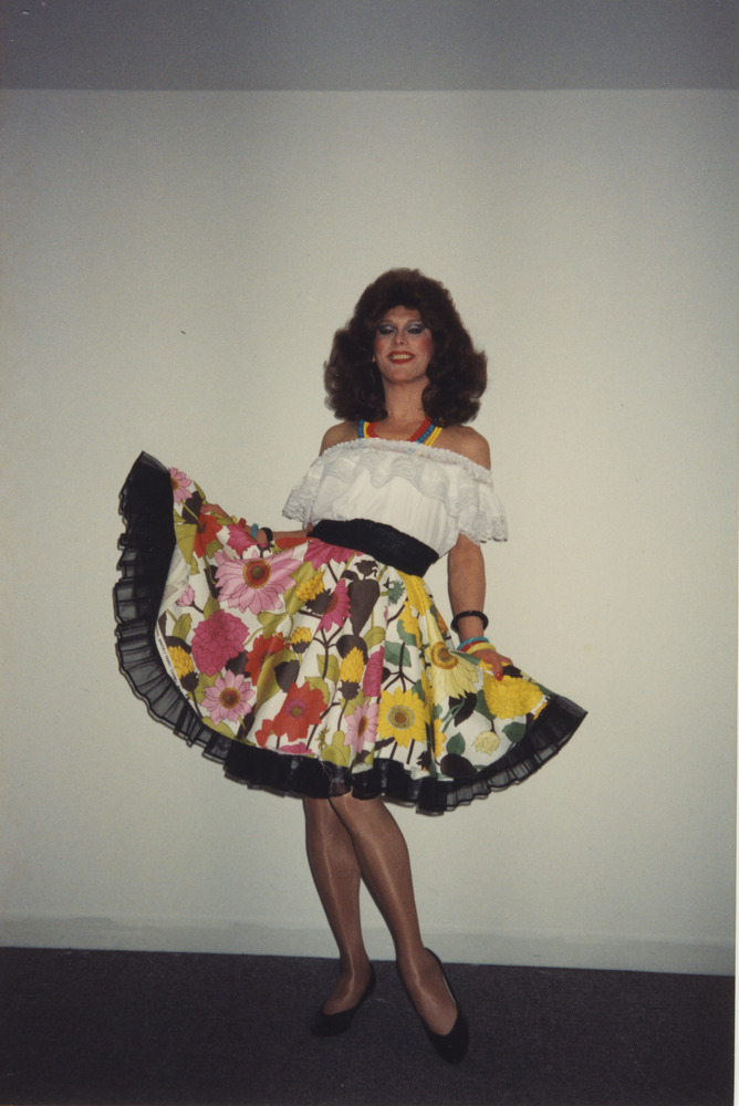 Download the full-sized image of Photograph of Alexis Francois in Colorful Flower Skirt