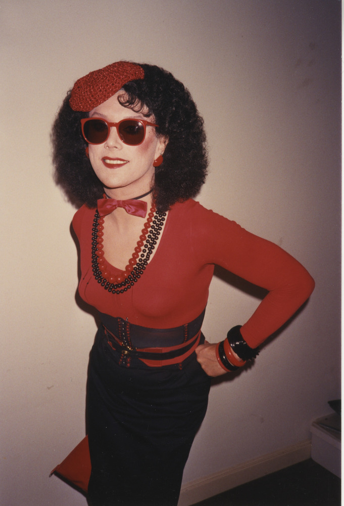 Download the full-sized image of Photograph of Alexis Francois in Red and Black Outfit