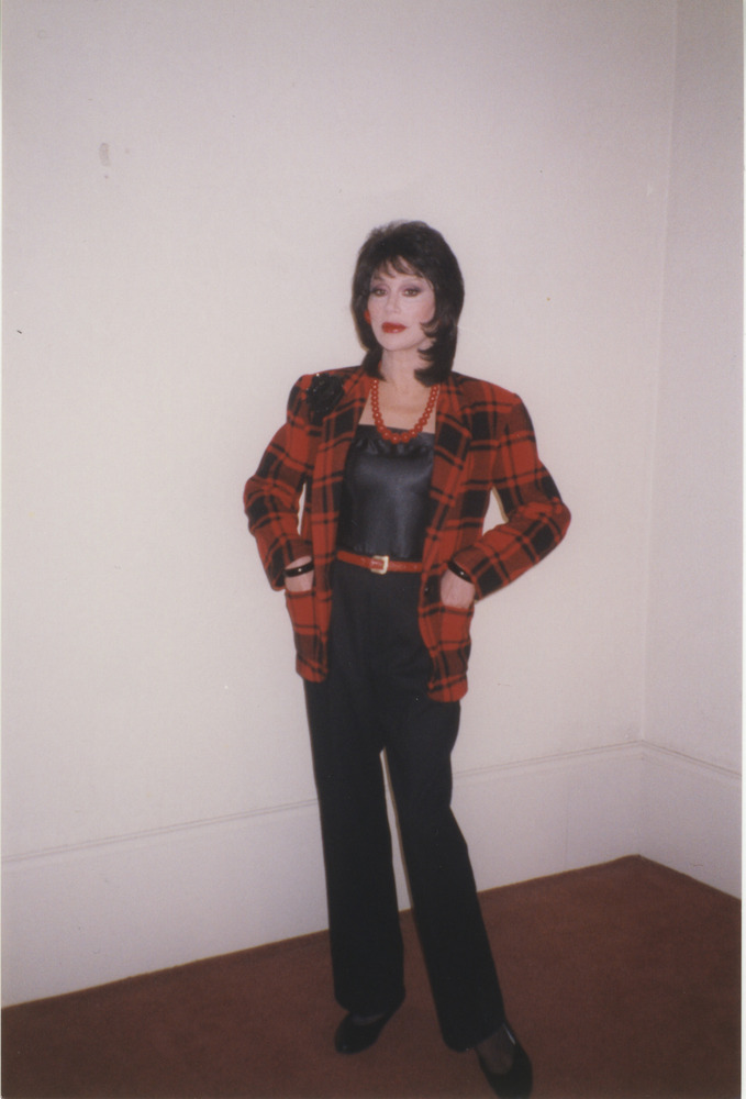 Download the full-sized image of Photograph of Alexis Francois in Black and Red Plaid Blazer