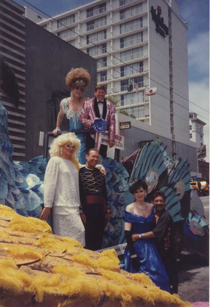 Download the full-sized image of Photograph of People in Formal Attire at Parade Float
