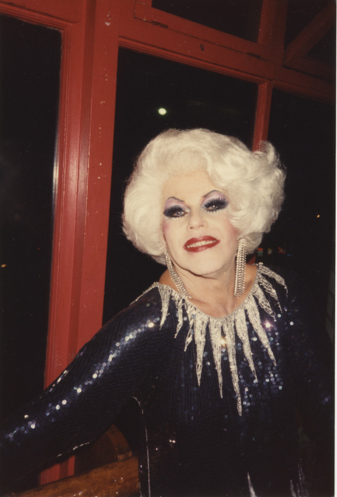 Download the full-sized image of Photograph of Person in Blue Sequin Dress with White Wig