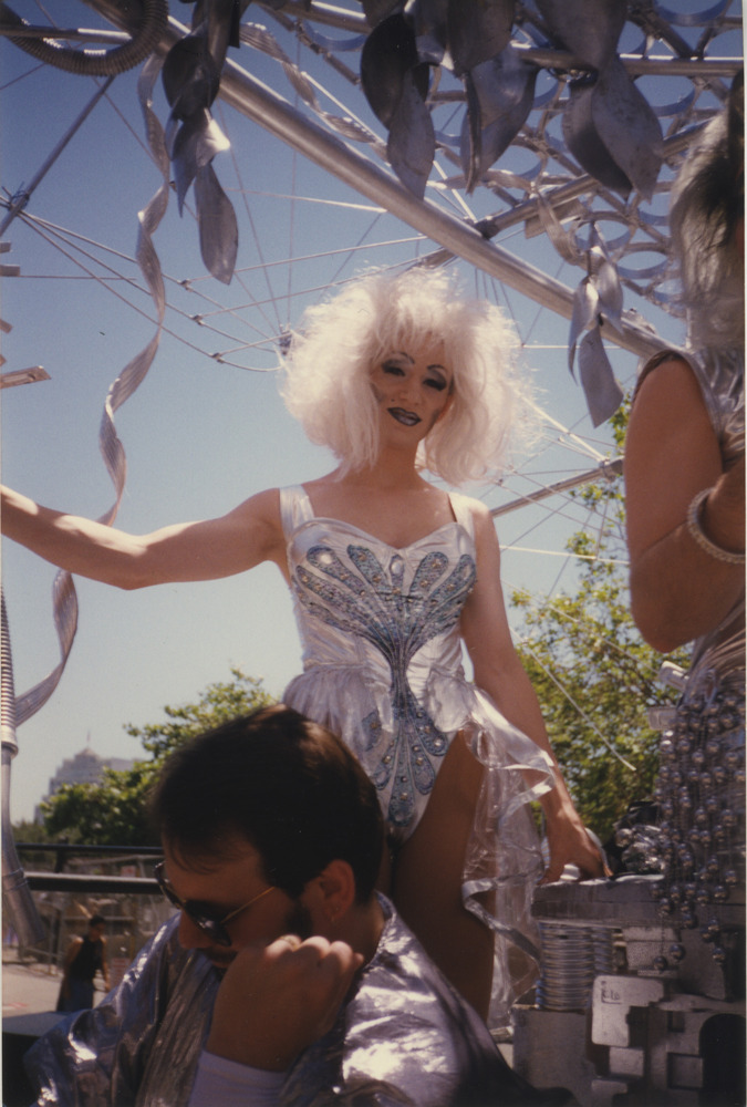 Download the full-sized image of Photograph of Person in Silver Bodysuit