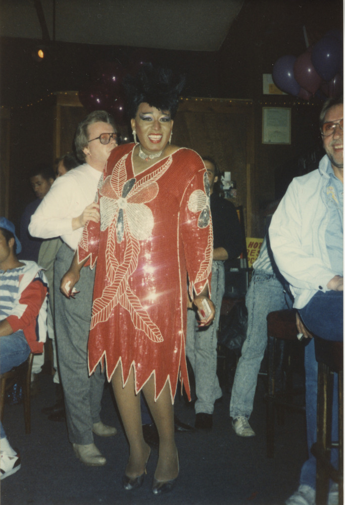 Download the full-sized image of Photograph of Person Wearing Red Dress at Party