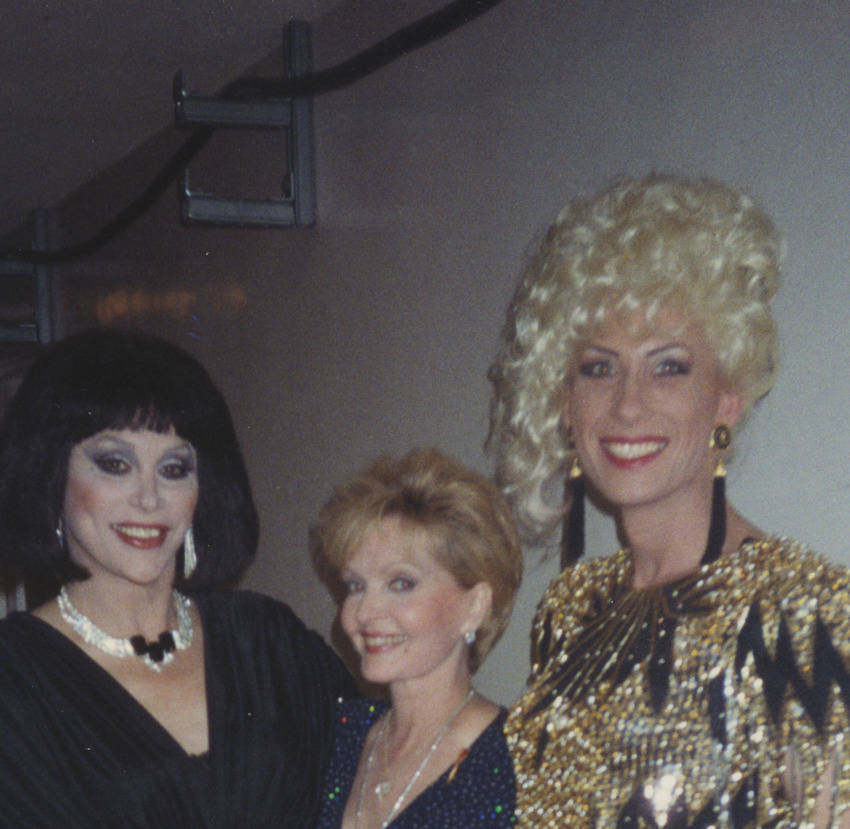 Download the full-sized image of Photograph of Alexis Francois With People in Party Dresses