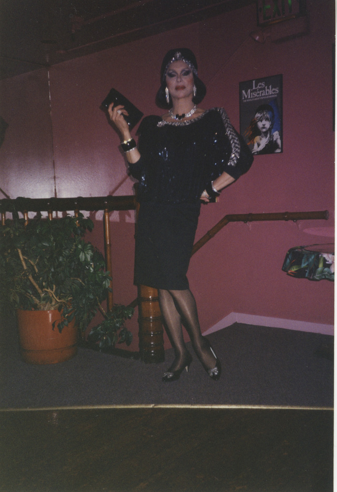 Download the full-sized image of Photograph of Alexis Francois in Sparkly Black Dress