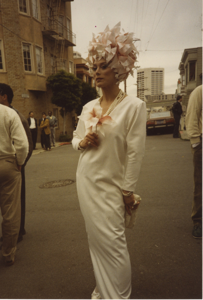 Download the full-sized image of Photograph of Alexis Francois in Slim White Dress and Headpiece