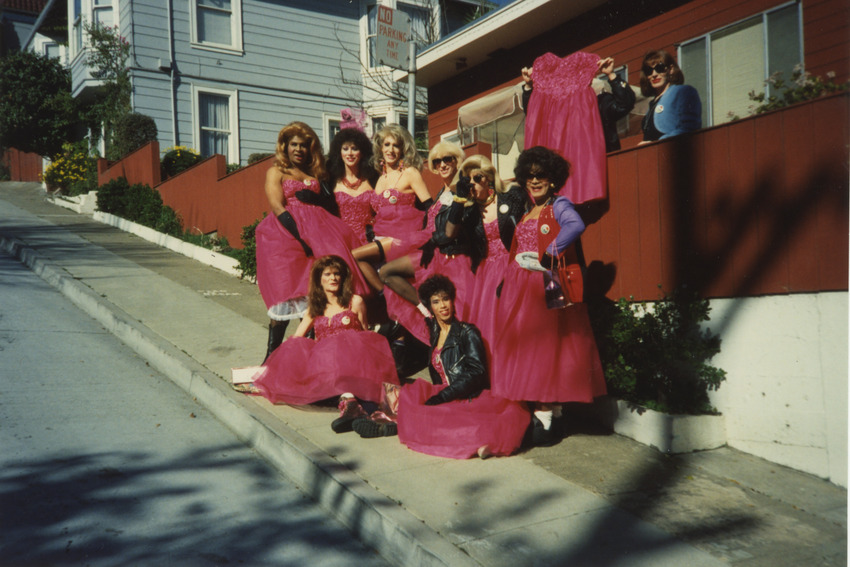 Download the full-sized image of Photograph of People in Pink Dresses on Street