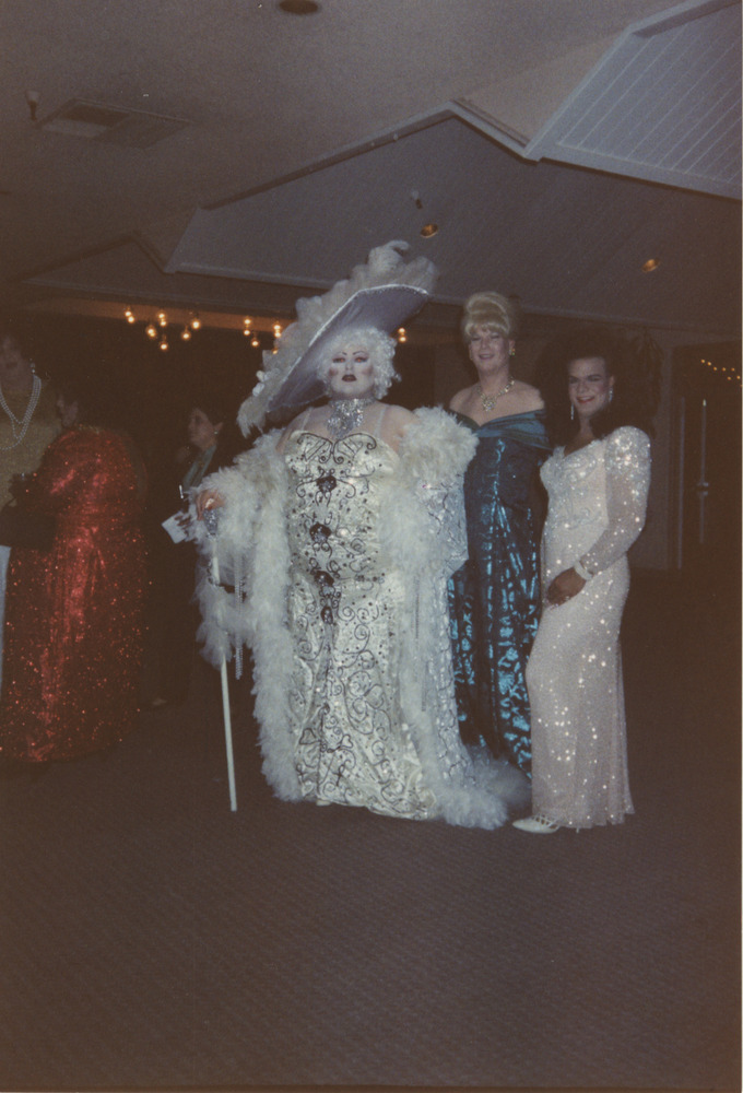 Download the full-sized image of Photograph of People in Drag with Floor-Length Gowns at Event