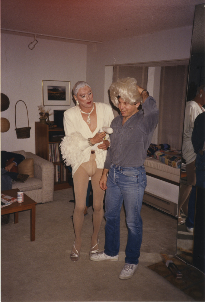 Download the full-sized image of Photograph of Alexis Francois Getting Ready While a Man Tries on her Wig