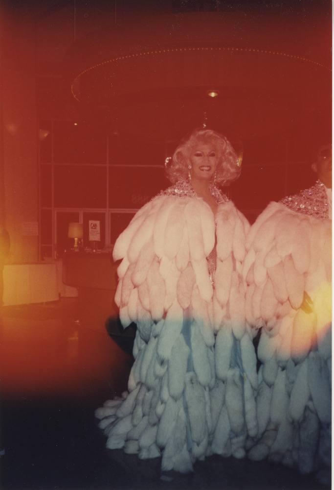 Download the full-sized image of Photograph of Person in Large White Fur Coat