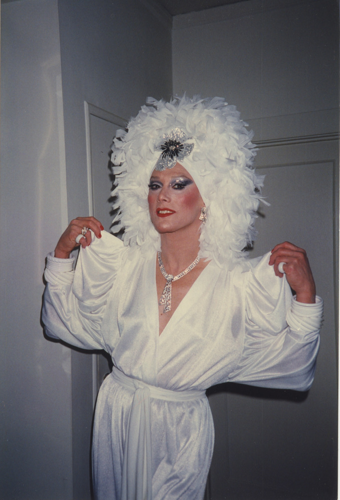 Download the full-sized image of Photograph of Alexis Francois in White Outfit and Feathery Headpiece